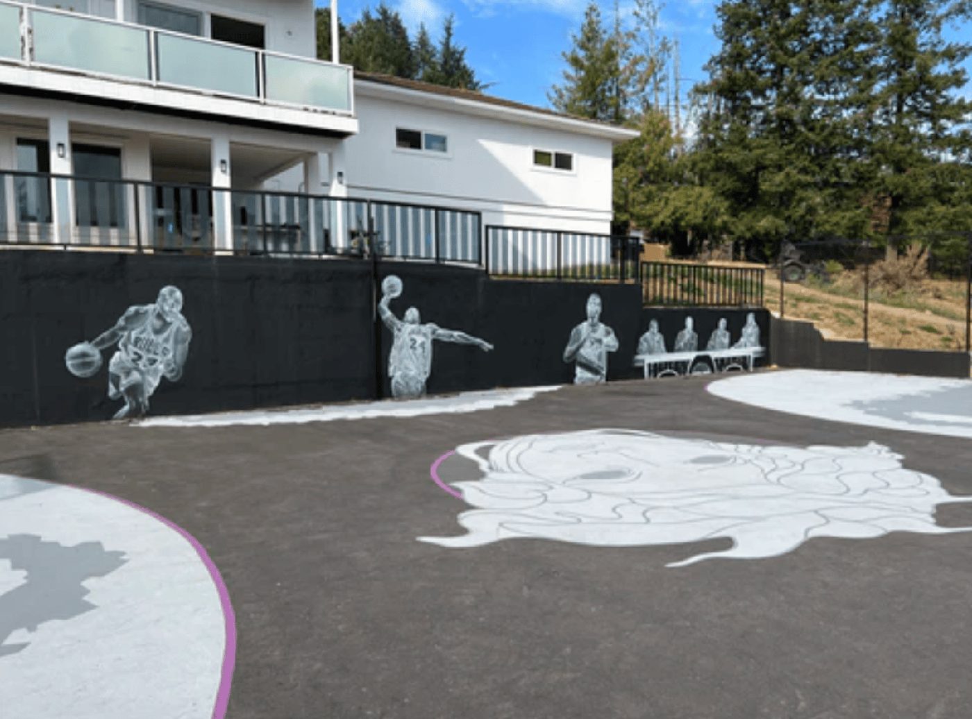 A painted basketball court commissioned from Haven artists
